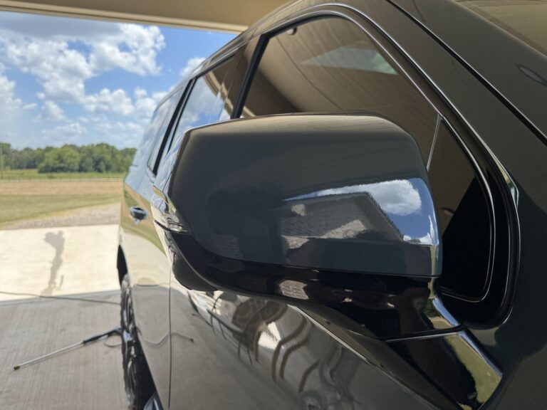 Chevrolet SUV side mirror after detailing
